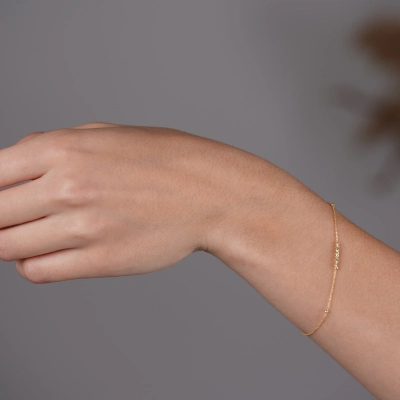 Bratara din aur galben de 14K cu lant diamantat si bile diamantate