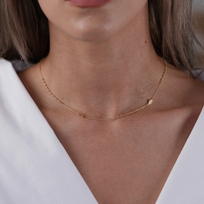 Rozariu din aur galben de 14K  la baza gatului cu cruce si lant diamantat